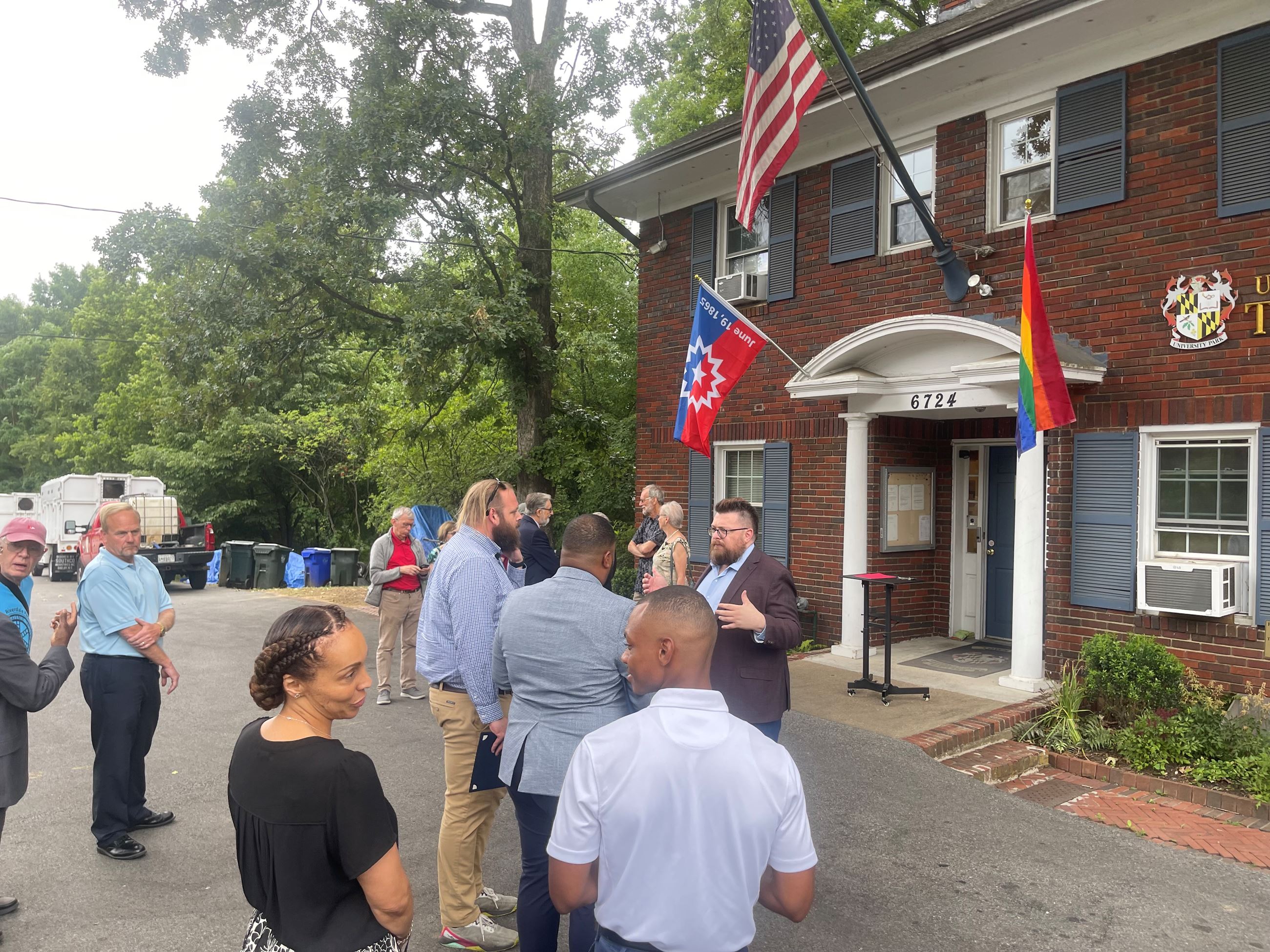 Mayor Biermann speaking to attendees in front of Town Hall
